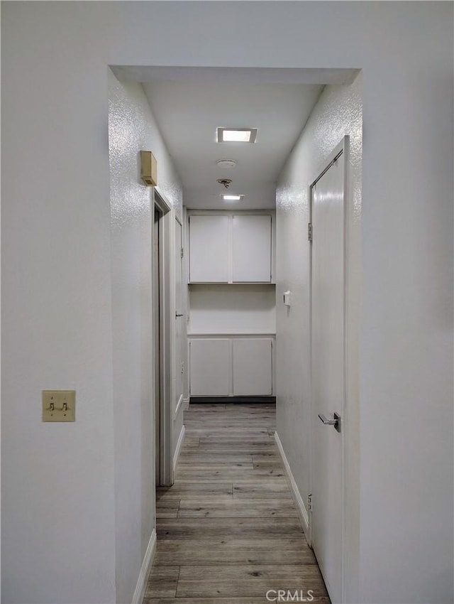 14055 Camino Del Oro, Riverside, CA 92508 - corridor with light wood-style flooring and baseboards