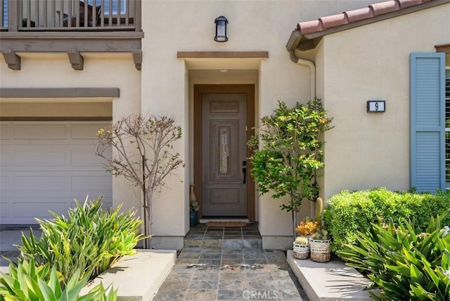 9 Healdsbury, Irvine, CA 92602 - property entrance with a garage and stucco siding
