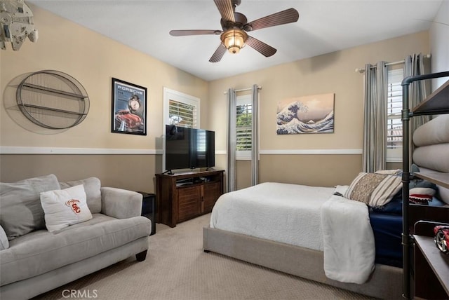 9 Healdsbury, Irvine, CA 92602 - bedroom featuring multiple windows, a ceiling fan, and carpet flooring