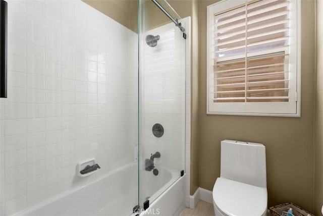 9 Healdsbury, Irvine, CA 92602 - bathroom featuring baseboards, toilet, and bathing tub / shower combination
