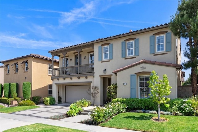 9 Healdsbury, Irvine, CA 92602 - mediterranean / spanish house with a front lawn, a garage, stucco siding, concrete driveway, and a balcony