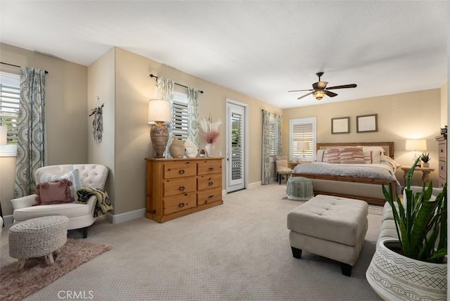 9 Healdsbury, Irvine, CA 92602 - carpeted bedroom featuring baseboards, ceiling fan, multiple windows, and access to exterior