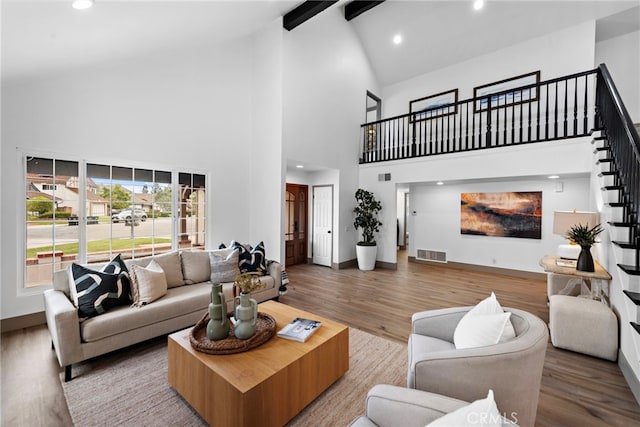 28166 Camellia Ct, Laguna Niguel, CA 92677 - living area with stairway, high vaulted ceiling, beamed ceiling, wood finished floors, and baseboards