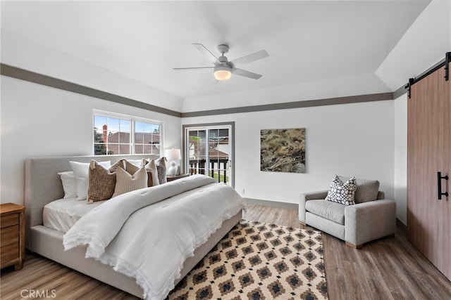 28166 Camellia Ct, Laguna Niguel, CA 92677 - bedroom with ceiling fan, access to outside, light wood-style flooring, and a barn door
