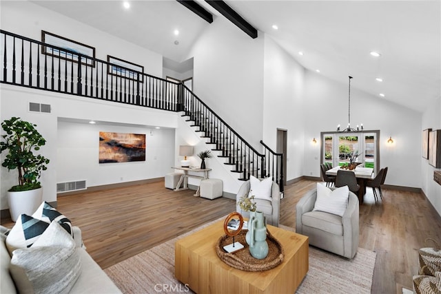 28166 Camellia Ct, Laguna Niguel, CA 92677 - living room with recessed lighting, stairway, high vaulted ceiling, light wood-type flooring, and visible vents