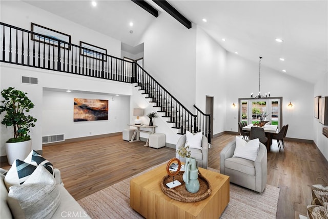 28166 Camellia Ct, Laguna Niguel, CA 92677 - living room with high vaulted ceiling, stairs, light wood-type flooring, beam ceiling, and recessed lighting