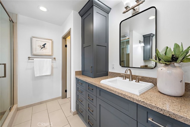 28166 Camellia Ct, Laguna Niguel, CA 92677 - bathroom with vanity, a shower stall, tile patterned flooring, and recessed lighting
