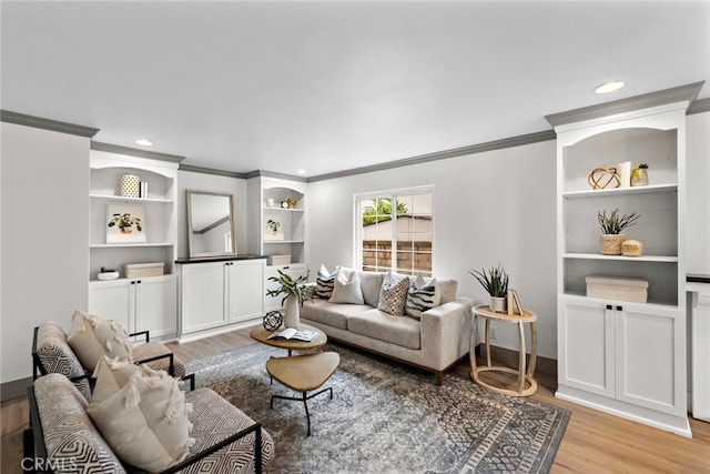 28166 Camellia Ct, Laguna Niguel, CA 92677 - living area with ornamental molding, light wood-type flooring, recessed lighting, and built in shelves