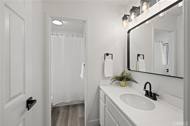 26 Apache Dr, Trabuco Canyon, CA 92679 - bathroom featuring vanity, wood finished floors, toilet, and a shower with shower curtain