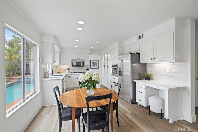 26 Apache Dr, Trabuco Canyon, CA 92679 - dining area featuring recessed lighting, light wood-type flooring, and baseboards