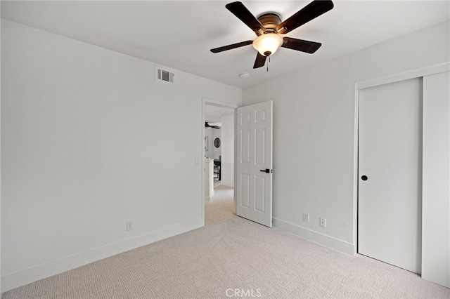 26 Apache Dr, Trabuco Canyon, CA 92679 - unfurnished bedroom with light colored carpet, a closet, baseboards, and ceiling fan