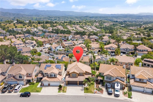 aerial view with a residential view and a mountain view