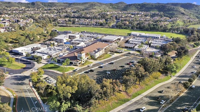 aerial view featuring a mountain view and a residential view