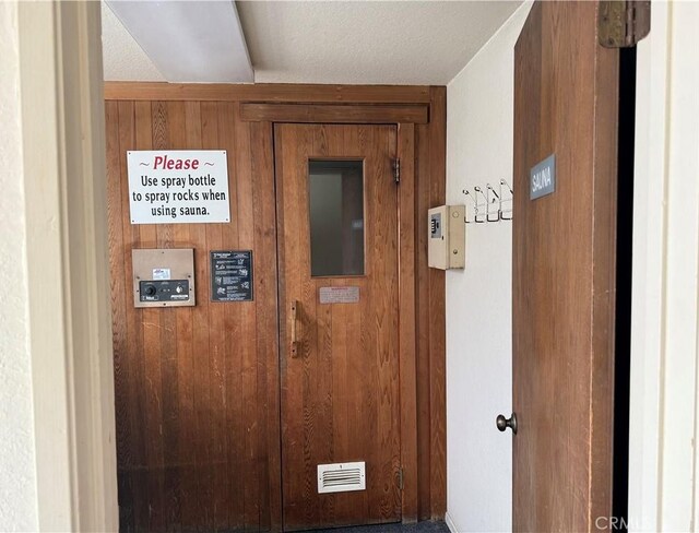 2599 Walnut Ave, Unit Signal Hill, CA 90755 - corridor featuring wooden walls