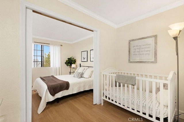 2599 Walnut Ave, Unit Signal Hill, CA 90755 - bedroom with ornamental molding and wood finished floors