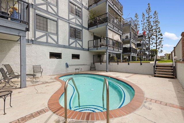 2599 Walnut Ave, Unit Signal Hill, CA 90755 - outdoor pool with a patio and stairway