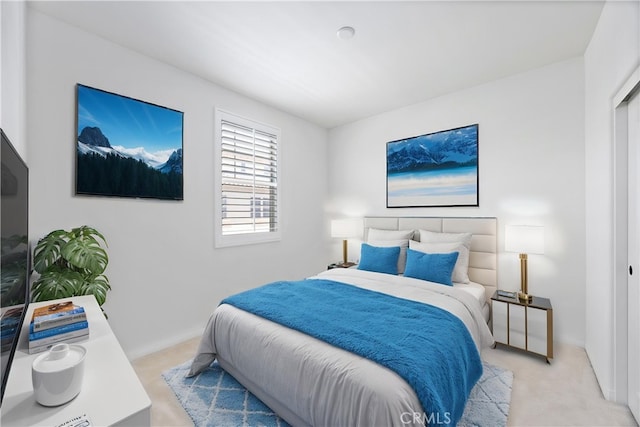 3240 S Westmont Ln Unit 5, Ontario, CA 91761 - bedroom with light colored carpet and baseboards