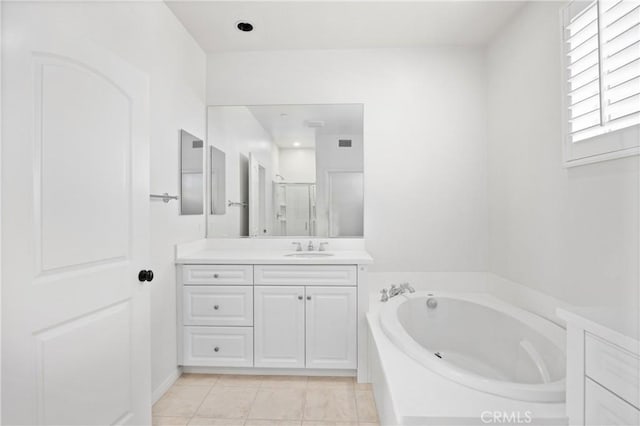 3240 S Westmont Ln Unit 5, Ontario, CA 91761 - bathroom featuring a bath, visible vents, vanity, and a stall shower