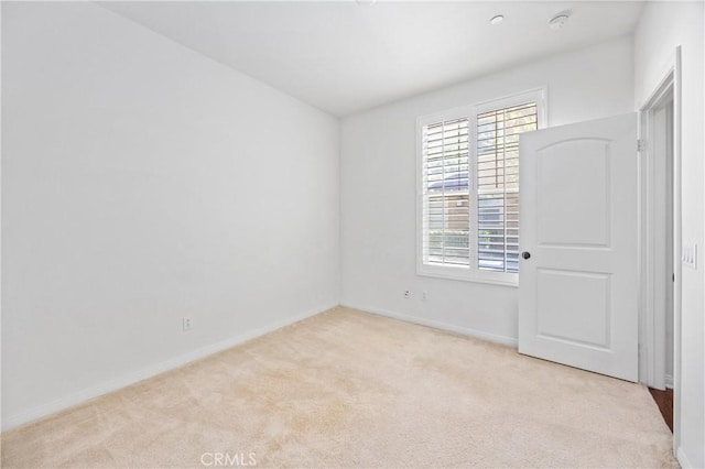 3240 S Westmont Ln Unit 5, Ontario, CA 91761 - carpeted spare room featuring baseboards and a smoke detector