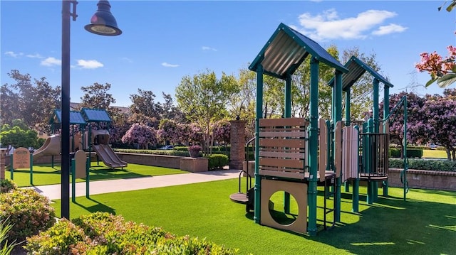 3240 S Westmont Ln Unit 5, Ontario, CA 91761 - communal playground featuring a yard