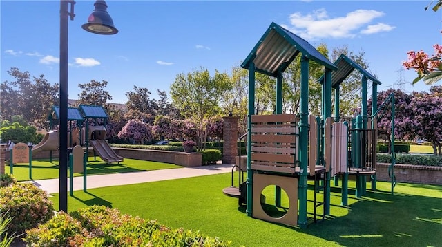 3240 S Westmont Ln Unit 5, Ontario, CA 91761 - communal playground featuring a lawn