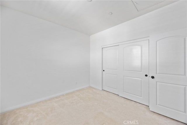 3240 S Westmont Ln Unit 5, Ontario, CA 91761 - unfurnished bedroom featuring light colored carpet and a closet