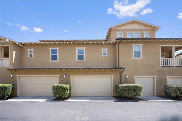3240 S Westmont Ln Unit 5, Ontario, CA 91761 - multi unit property featuring an attached garage and stucco siding