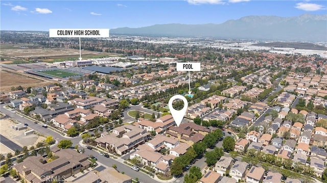 3240 S Westmont Ln Unit 5, Ontario, CA 91761 - drone / aerial view with a mountain view and a residential view