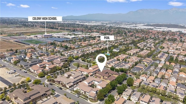 3240 S Westmont Ln Unit 5, Ontario, CA 91761 - aerial view of property's location with a mountainous background and nearby suburban area