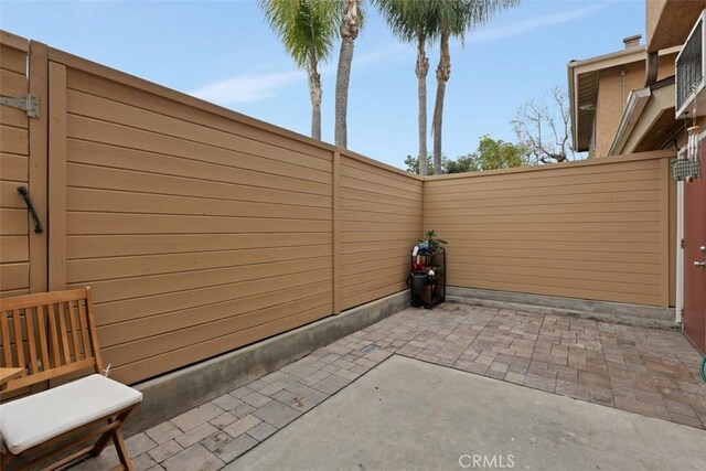 view of patio with fence