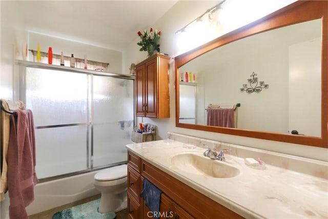 1310 W Lambert Rd Unit 180, La Habra, CA 90631 - bathroom with toilet, combined bath / shower with glass door, and vanity