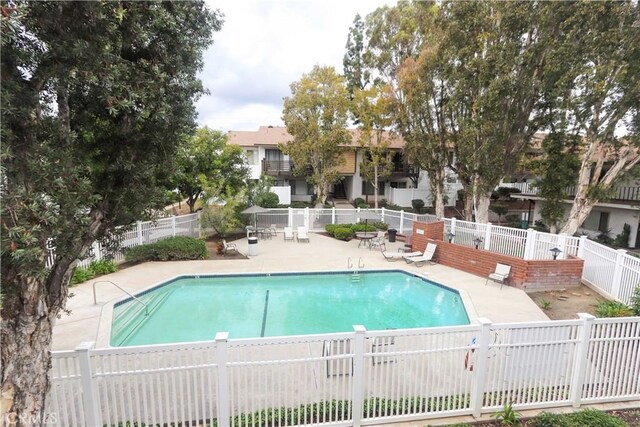 1310 W Lambert Rd Unit 180, La Habra, CA 90631 - community pool with fence and a patio area
