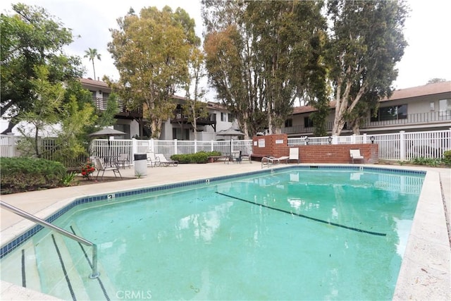1310 W Lambert Rd Unit 180, La Habra, CA 90631 - pool with fence and a patio area