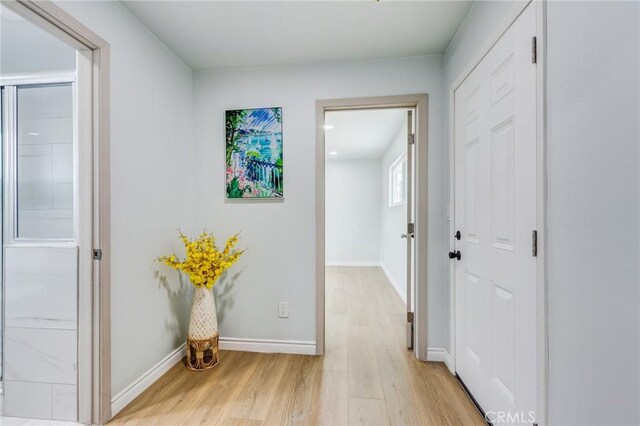 2315 Hillview Ave, Monterey Park, CA 91754 - hallway featuring light wood-style flooring and baseboards