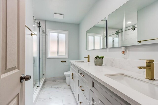 2315 Hillview Ave, Monterey Park, CA 91754 - bathroom with toilet, marble look tiles, a stall shower, and double vanity