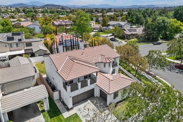 bird's eye view with a mountain view and a residential view