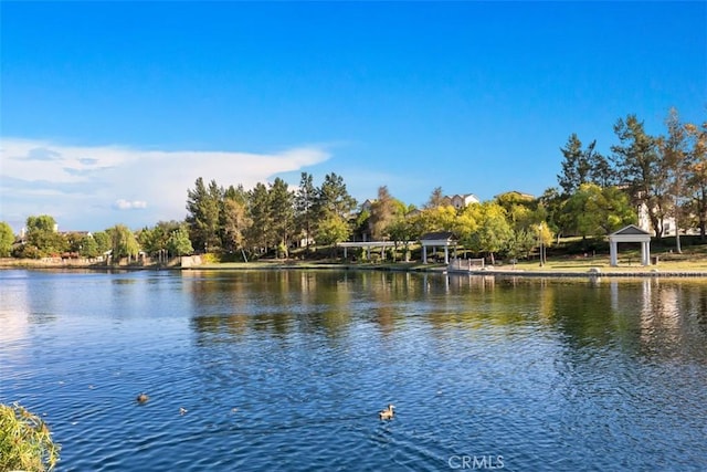 property view of water with a gazebo