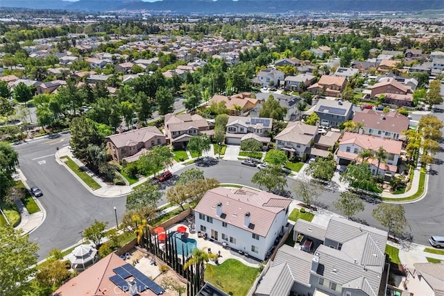aerial view featuring a mountain view and a residential view
