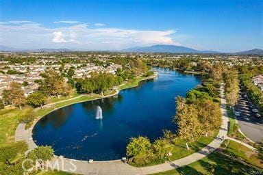 bird's eye view with a water and mountain view