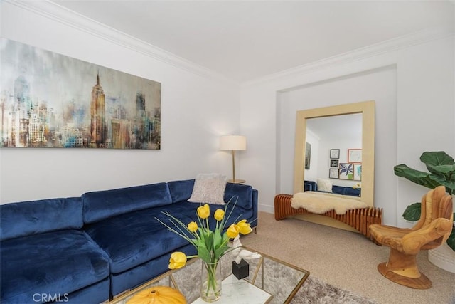 carpeted living area with ornamental molding