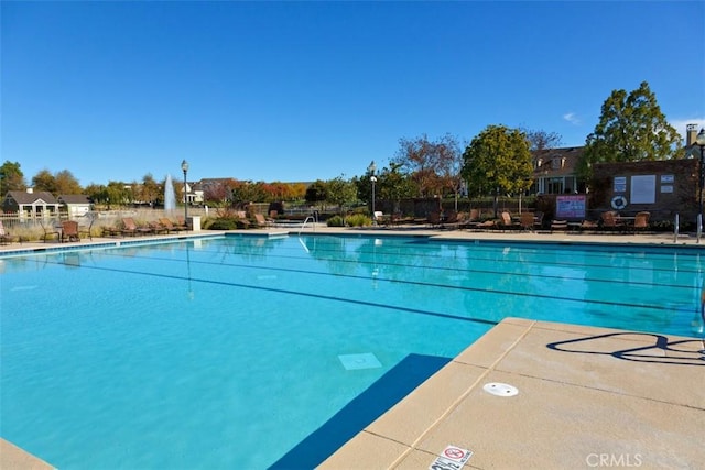 community pool with fence
