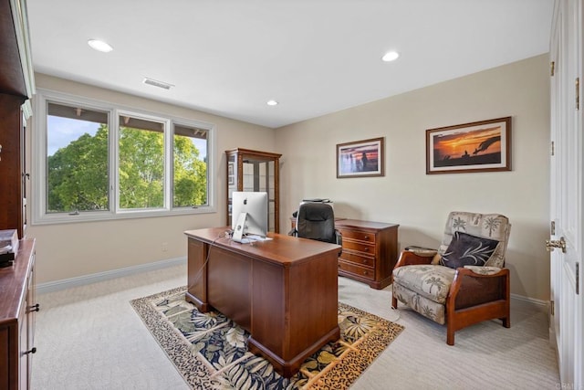 office space featuring recessed lighting, light carpet, visible vents, and baseboards