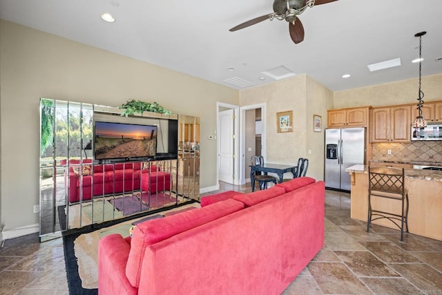 1072 Wiegand, Encinitas, CA 92024 - living area featuring stone tile floors, a ceiling fan, and recessed lighting