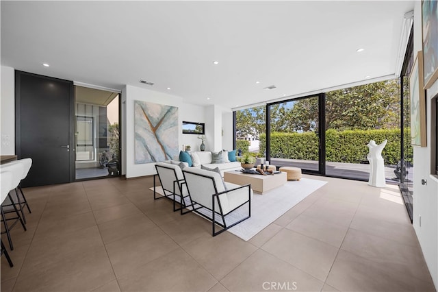9 Temple Ave, Long Beach, CA 90803 - tiled living area with recessed lighting, expansive windows, and visible vents