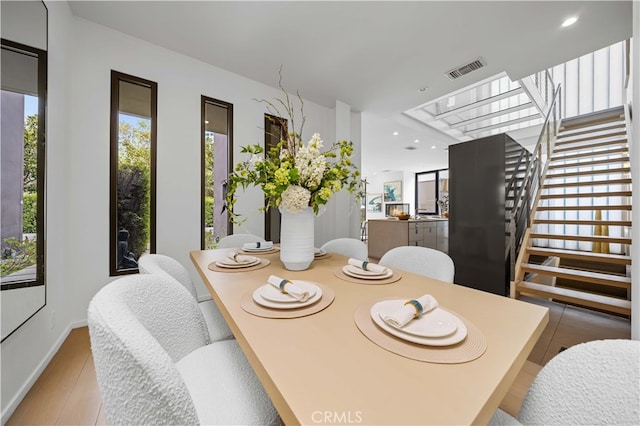 9 Temple Ave, Long Beach, CA 90803 - dining space with stairway, baseboards, visible vents, and recessed lighting