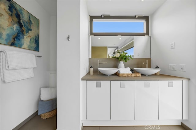 9 Temple Ave, Long Beach, CA 90803 - full bathroom featuring baseboards, a sink, and double vanity