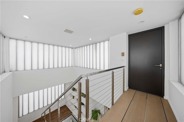 9 Temple Ave, Long Beach, CA 90803 - hall with recessed lighting, visible vents, and an upstairs landing