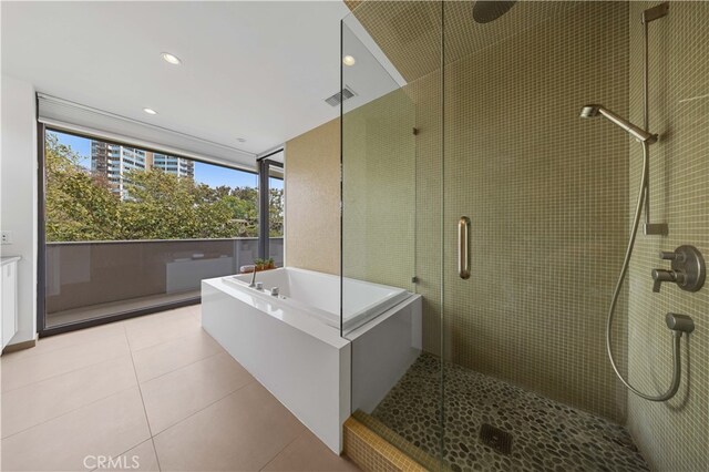 9 Temple Ave, Long Beach, CA 90803 - full bath featuring a bath, visible vents, tile patterned flooring, and a stall shower