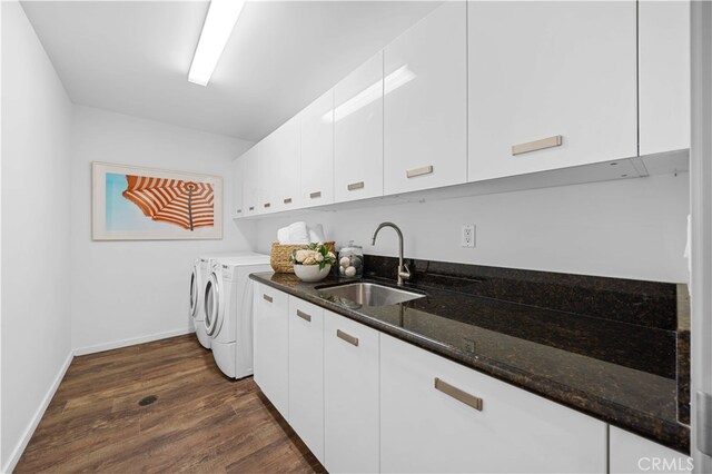 9 Temple Ave, Long Beach, CA 90803 - laundry area with a sink, washer and dryer, cabinet space, dark wood finished floors, and baseboards