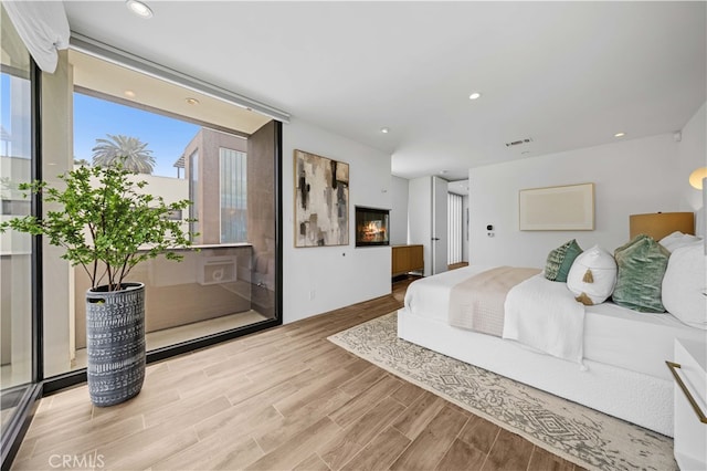 9 Temple Ave, Long Beach, CA 90803 - bedroom featuring visible vents, wood finished floors, and recessed lighting